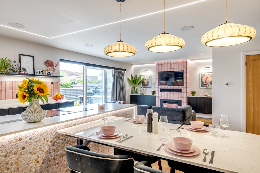 pink and black tiled kitchen