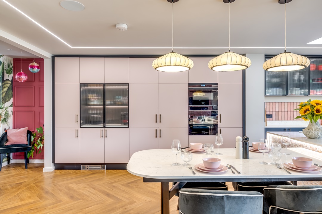 pink and black tiled kitchen