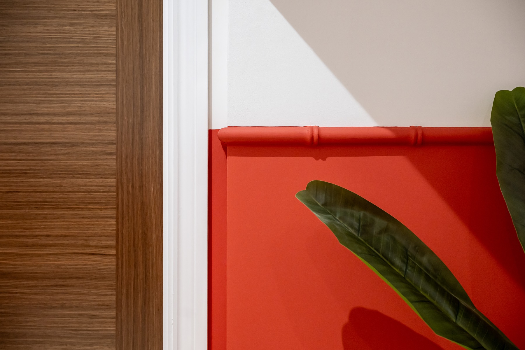 Red and orange hall way - interiors