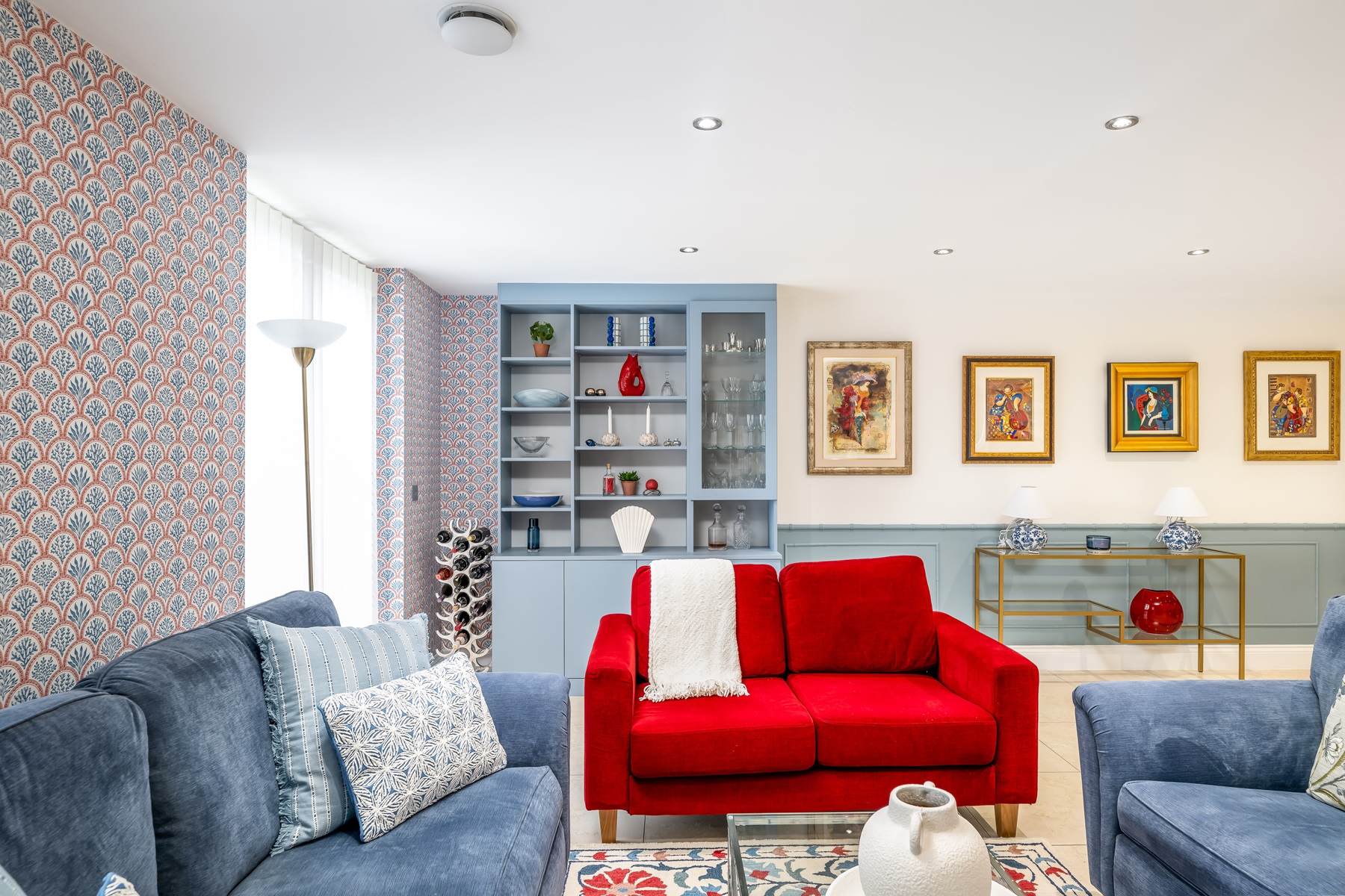Blue white and red living room bushey interiors