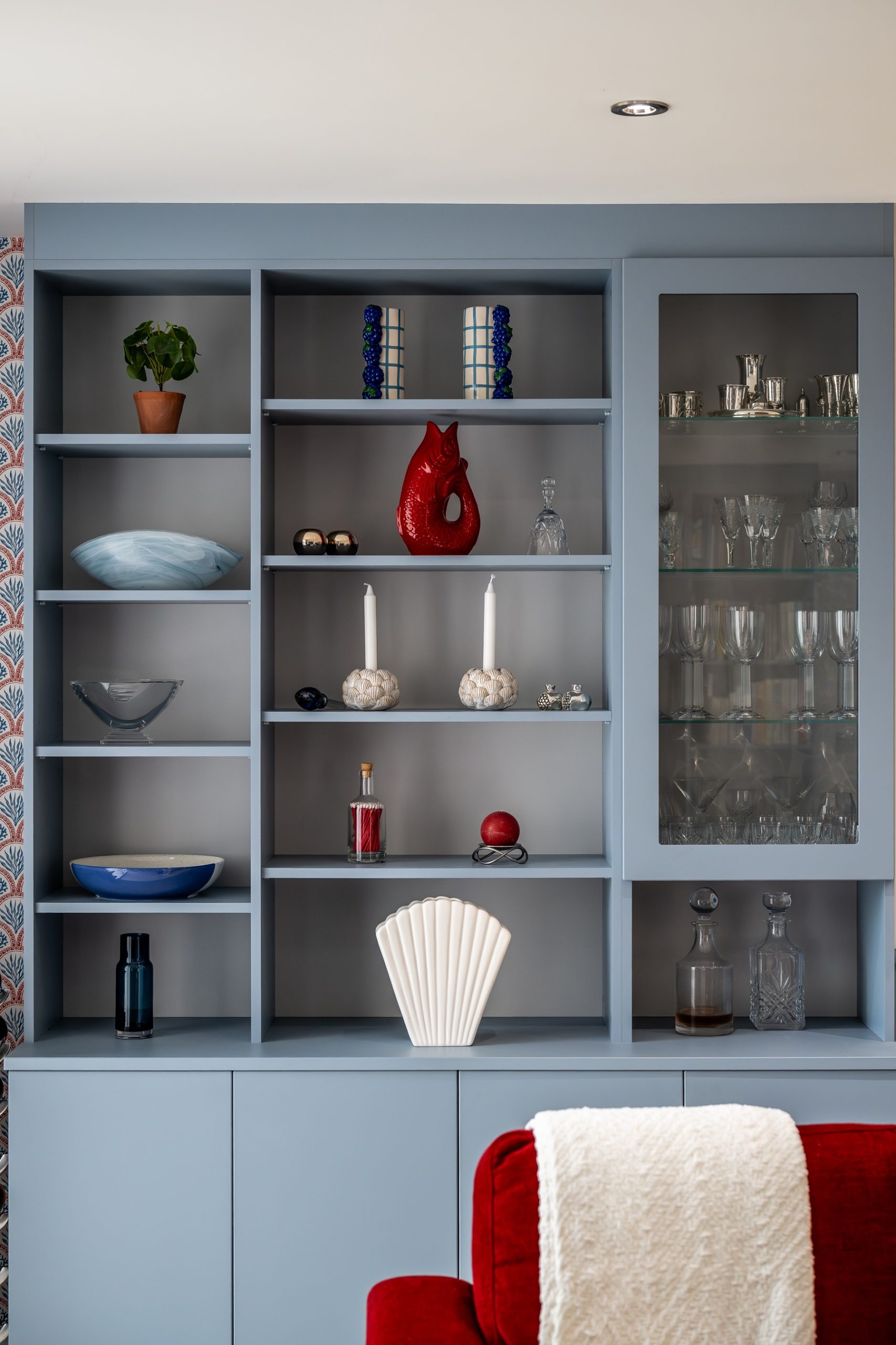 Blue white and red living room bushey interiors