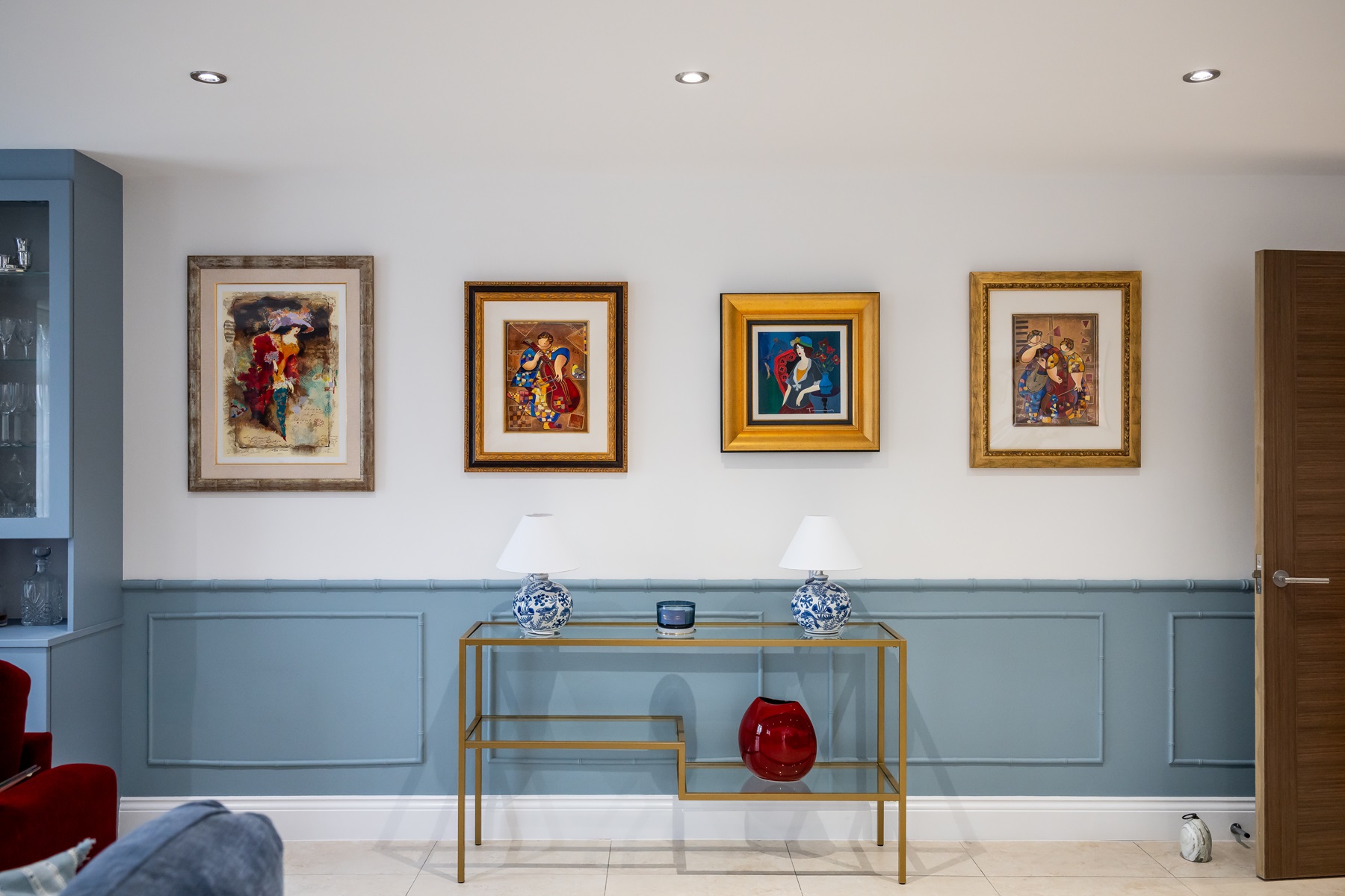 Blue white and red living room bushey interiors